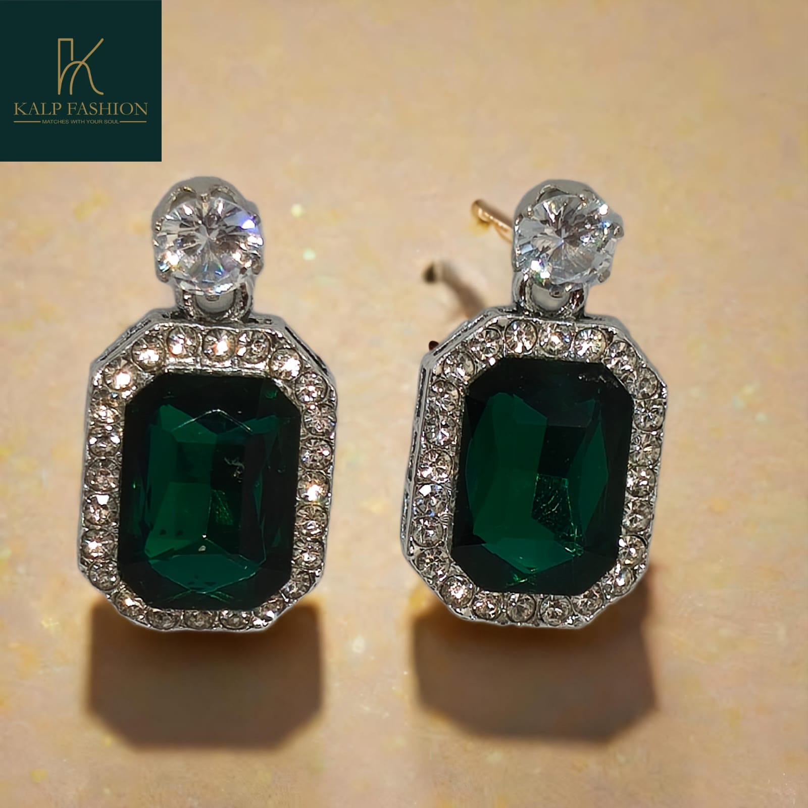 Emerald Green Stone Silver Plated earrings with (AD)